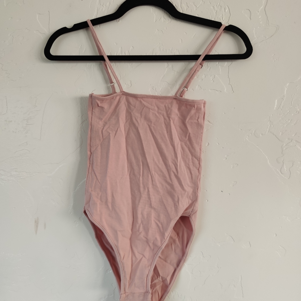 Pink body suit